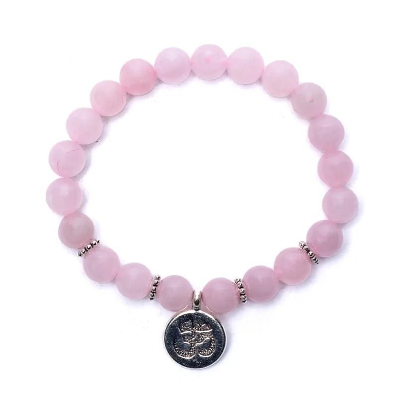 Mala / bracelet en quartz rose élastique avec Om Mala / bracelet en quartz rose élastique avec Om